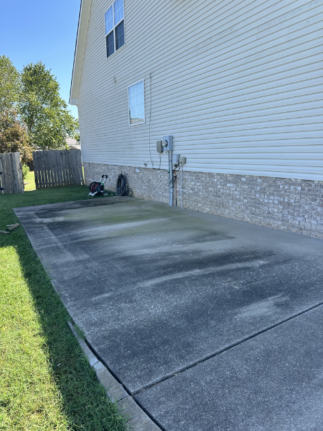 Soft washing house exterior by Falcons Pressure and Soft Washing experts